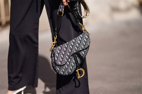 wearing dior saddle bag|dior saddle bag original.